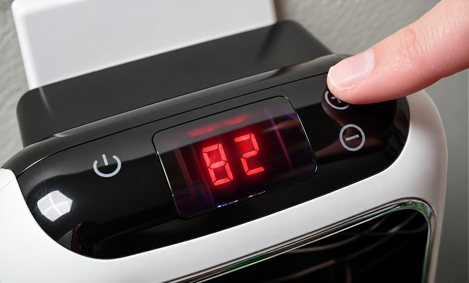 Close-up of the WellHeater digital control panel and thermostat display